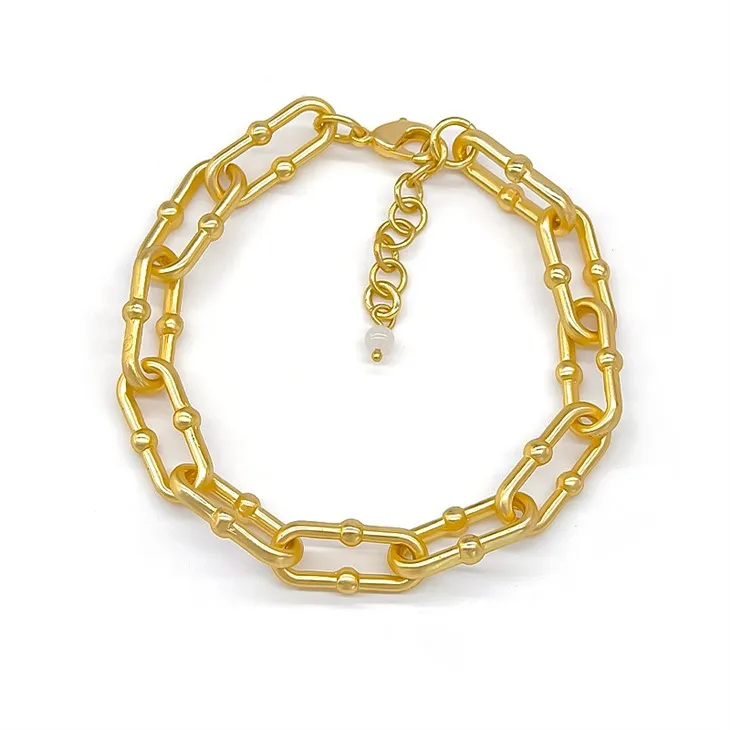 Zlata zapestnica s sponkami